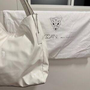Marc Cain handbag + sports mini skirt